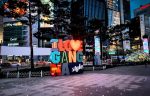 Seoul, South Korea - May 5, 2025: Buildings and road around Gangnam Square. Big sign with text "I LOVE GANGNAM STYLE"
